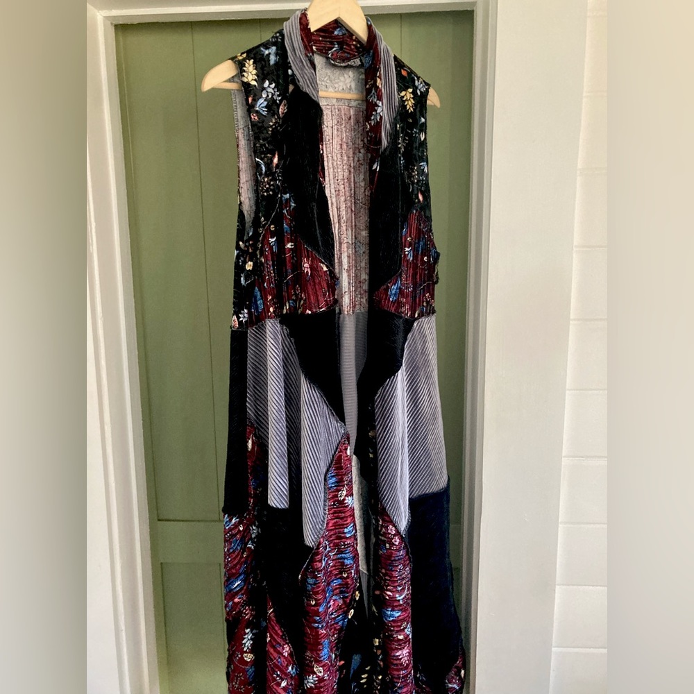 Pyramid brand long vest size S, but fits more like a Medium. Never worn.